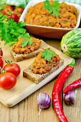 Image showing Sandwich with squash caviar and parsley on the board