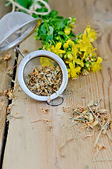 Image showing Herbal tea from tutsan dry in strainer