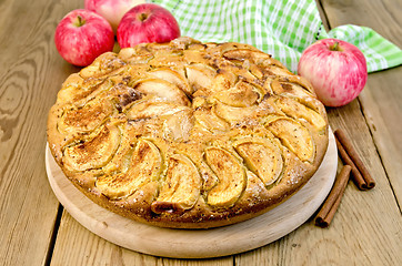 Image showing Pie apple whole on a blackboard