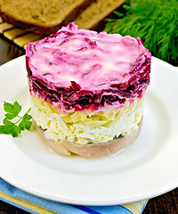 Image showing Herring with vegetables in a plate with bread