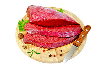 Image showing Meat beef with parsley on a round board