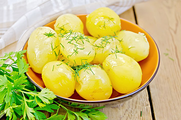 Image showing Potato boiled with parsley on the board