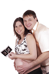 Image showing Expectant parents with baby picture