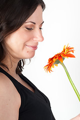 Image showing Portrait of young beautiful woman with flower