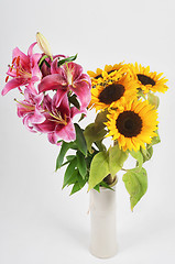 Image showing Lily and sunflowersin vase