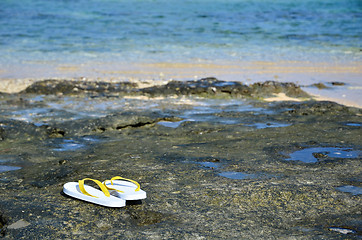 Image showing Sandals at tropical coast