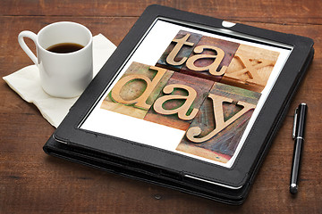 Image showing tax day reminder on digital tablet