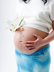 Image showing A pregnant young woman