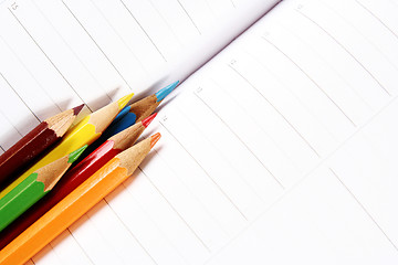 Image showing Color pencil and agenda