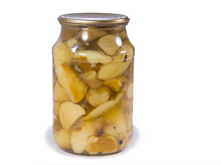 Image showing Canned mushrooms in a glass jar on a white background.