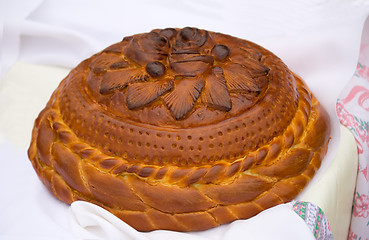 Image showing Beautiful cake on a white towel. Sold at the fair.