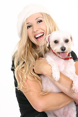 Image showing Laughing girl with puppy dog