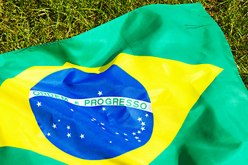 Image showing Brazil flag on green glass