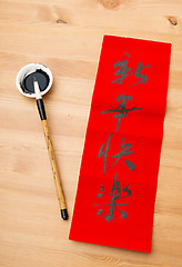 Image showing Writing of the lunar new year calligraphy, phrase meaning is ble