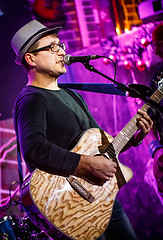 Image showing musician plays a guitar