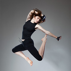 Image showing attractive jumping woman