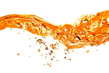 Image showing orange water splash isolated on white