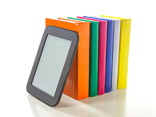 Image showing Electronic book reader with hard cover books