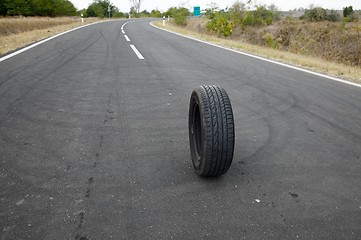 Image showing Wheel on road