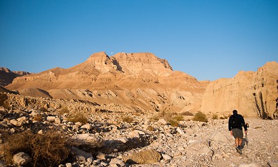 Image showing Tourists hiking in dead sea mountains