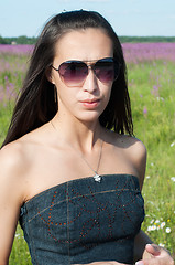 Image showing Beautiful brunette woman in sunglases