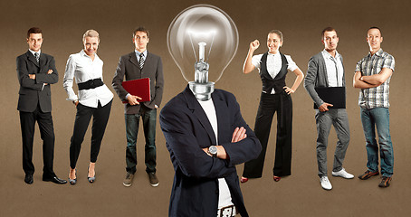 Image showing Business Team With Lamp Head