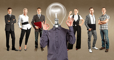 Image showing Business Team With Lamp Head