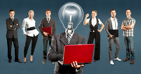 Image showing Business Team With Lamp Head