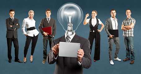 Image showing Business Team With Lamp Head