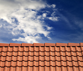 Image showing Roof tiles and sky with clouds