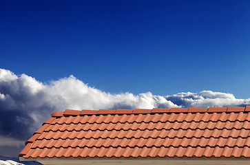 Image showing Roof tiles and blue sky in nice sunny day