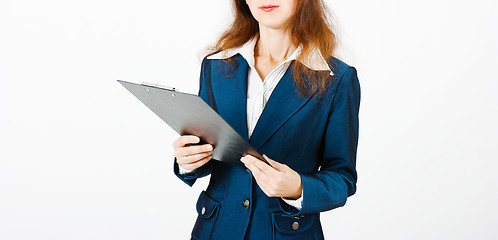 Image showing Young woman with a folder in hands