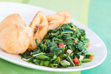 Image showing Callaloo Vegetable (Spinach) and Friend Dumplings - Caribbean St