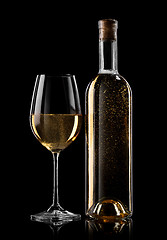 Image showing White wine on black