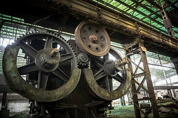 Image showing Large industrial hall with cogs