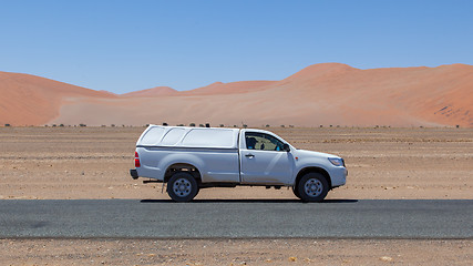 Image showing Car on a empty in the Namib desert