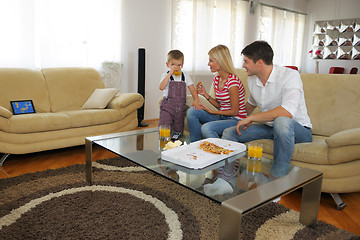 Image showing family eating pizza