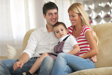 Image showing family at home using tablet computer