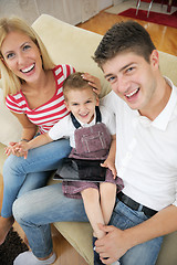 Image showing family at home using tablet computer