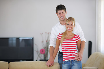 Image showing Relaxed young  couple watching tv at home