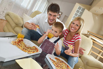 Image showing family eating pizza