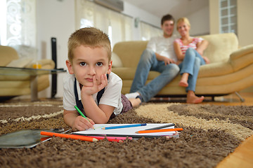 Image showing family drawing on school board at home