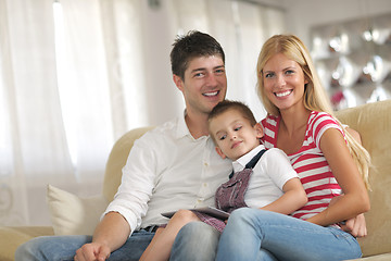 Image showing family at home using tablet computer