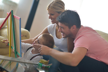 Image showing family drawing on school board at home