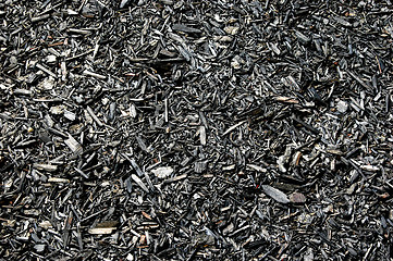 Image showing Black wood chips