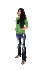 Image showing Girl standing in jeans.