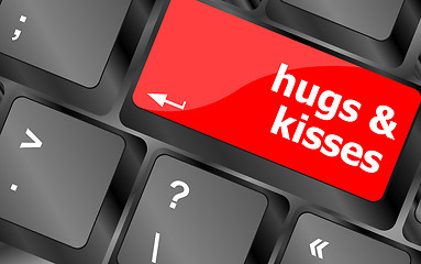 Image showing hugs and kisses words on computer keyboard keys