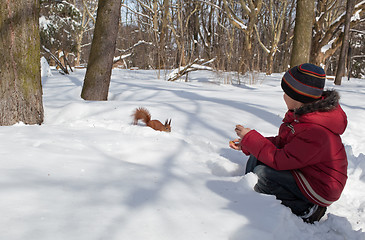 Image showing Squirrel and little boy