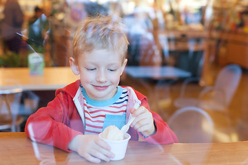 Image showing kid eating ice cream