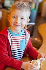 Image showing kid eating ice cream